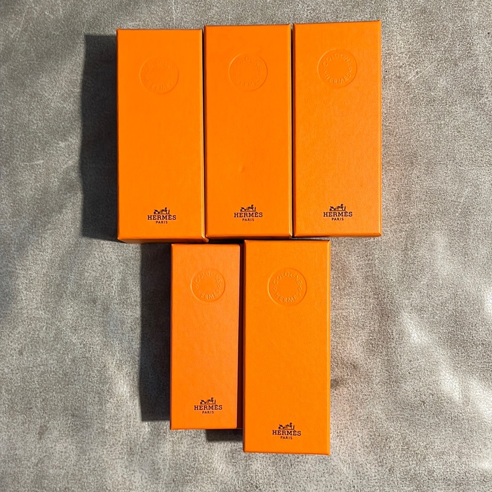 4 large 1 small Hermes cologne boxes.